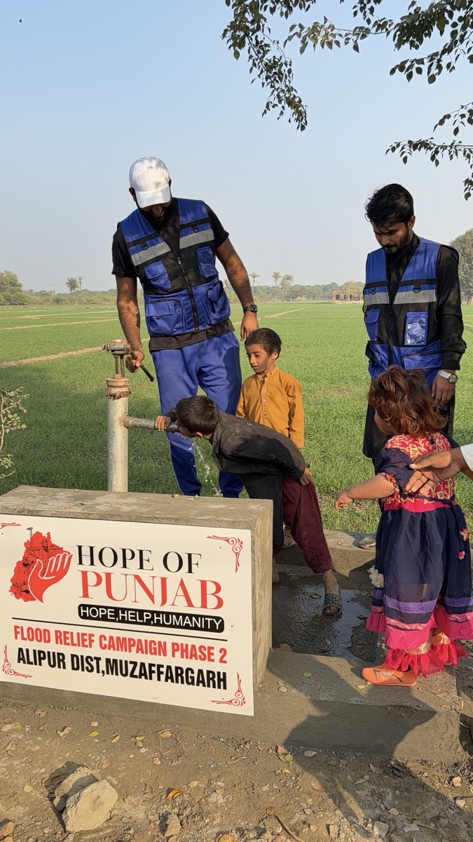 Hand Pump Installation 2025 - Families using new hand pump